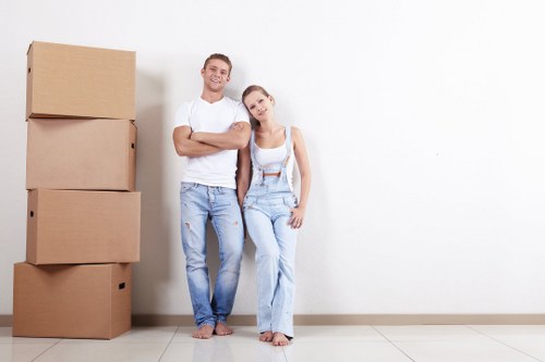 Person organizing boxes in Streatham storage unit