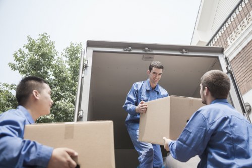 Packed boxes and furniture ready for flat removals in Streatham